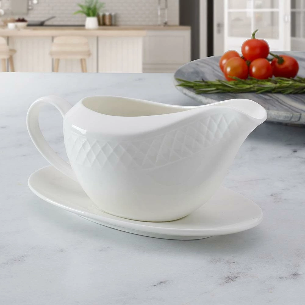 Deals ✔️ Mikasa® Trellis White Gravy Boat with Stand 🎉 4 Deals ✔️ Mikasa® Trellis White Gravy Boat with Stand 🎉 - Image 2